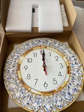 Brand new Elegant Gold and Crystal Wall Clock, not real stones